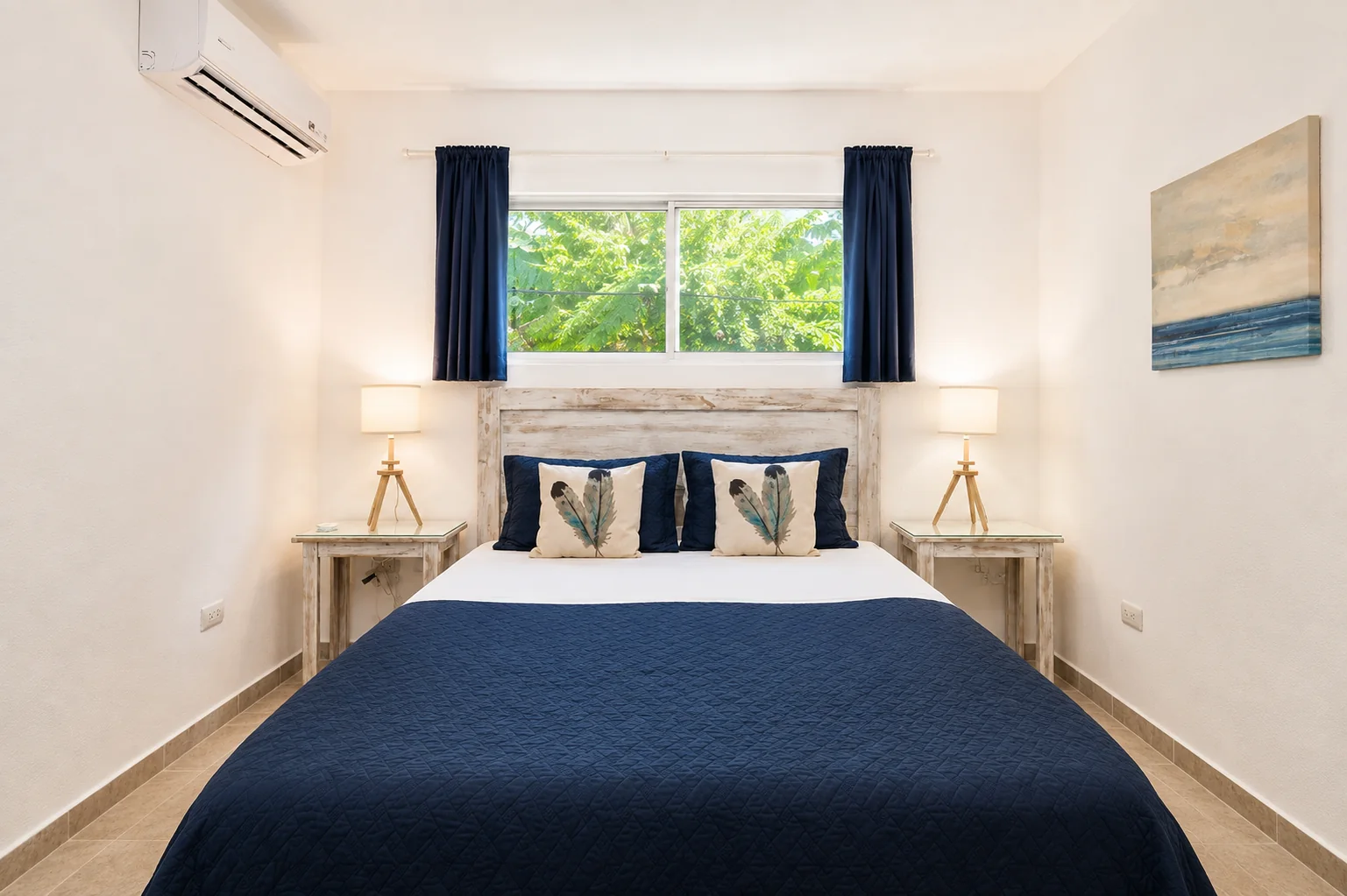 Bedroom 1 with queen bed and ensuite bathroom