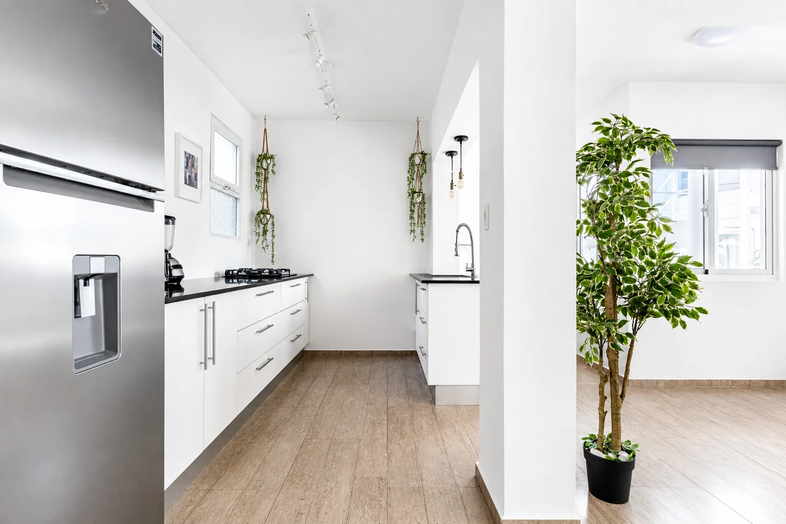 Kitchen with view towards the living space